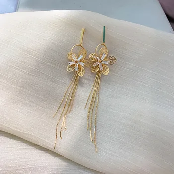 

Dominated creative new metal Hollow Crystal flowers Korean Drop earrings Long tassels temperament joker Women earrings 2019