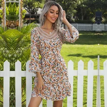 Primavera novo trompete manga comprida impresso v-neck costura vestido de renda, luz e estilo maduro temperamento commuter solto