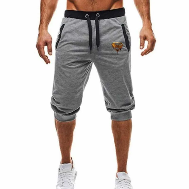 

HOWL LOFTY men's shorts compression Fast drying fashion Joggers sweatpants gyms Bodybuilding Golden superman print pants 2019
