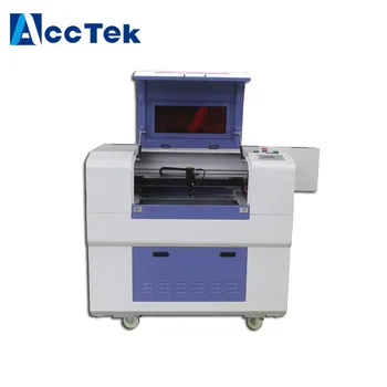 

Factory price 600*400mm mini co2 desktop laser engraving machine for plastic Ruida control system red light point