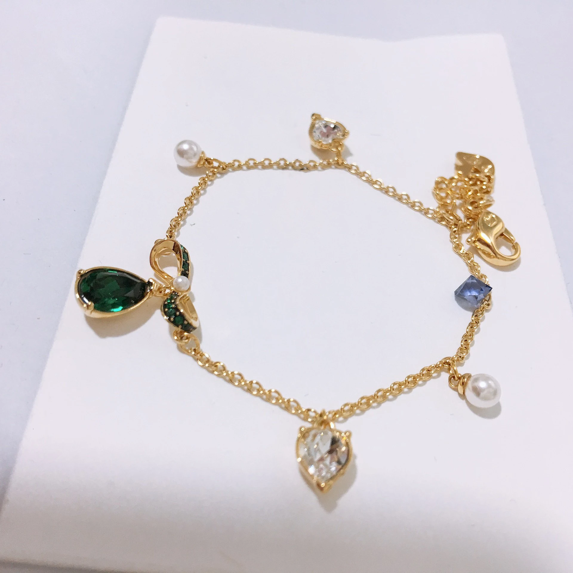 

High quality swa. {new style} green bow-knot drop of water punctured brace