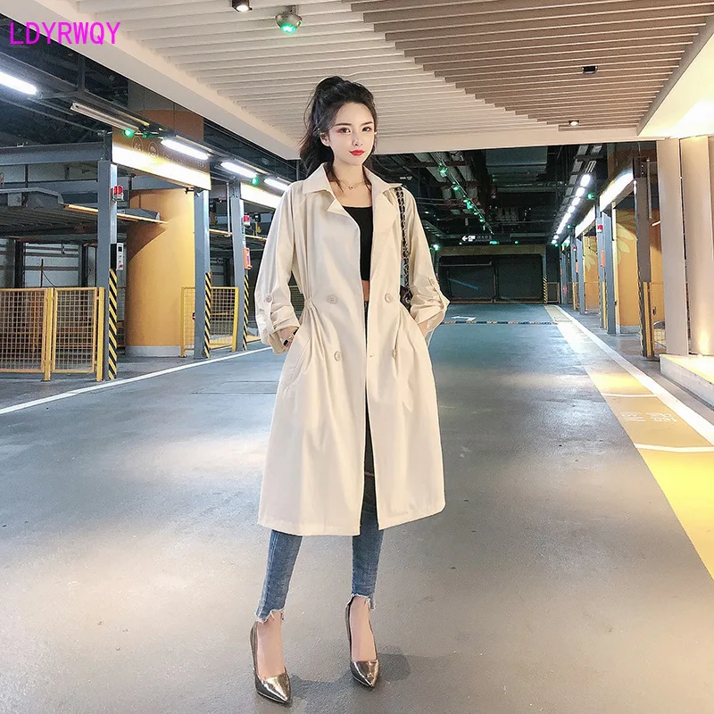 

2019 autumn and winter new Korean women's fashion lapel long sleeve double-breasted tie waist casual wild long trench coat