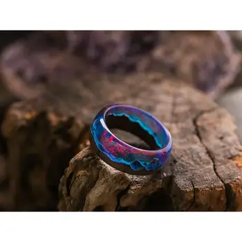 

Wood ring with insert of jewelry resin Norway lights