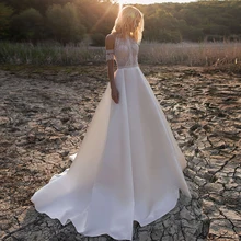 

Simple A-Line Wedding Dresses Sexy Illusion O Neck Off Shoulder Button Cut-Out Lace Appliqued New 2021 Long Bridal Gowns Custom