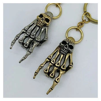 

Mini Creative Brass Skull Hand Statue DIY Keychain Necklace Bag Pendant Vintage Decoration Ornament Funny Toy Gift