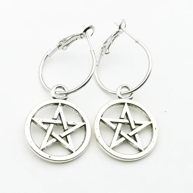 Share 136+ hoop earrings meaning seven.edu.vn