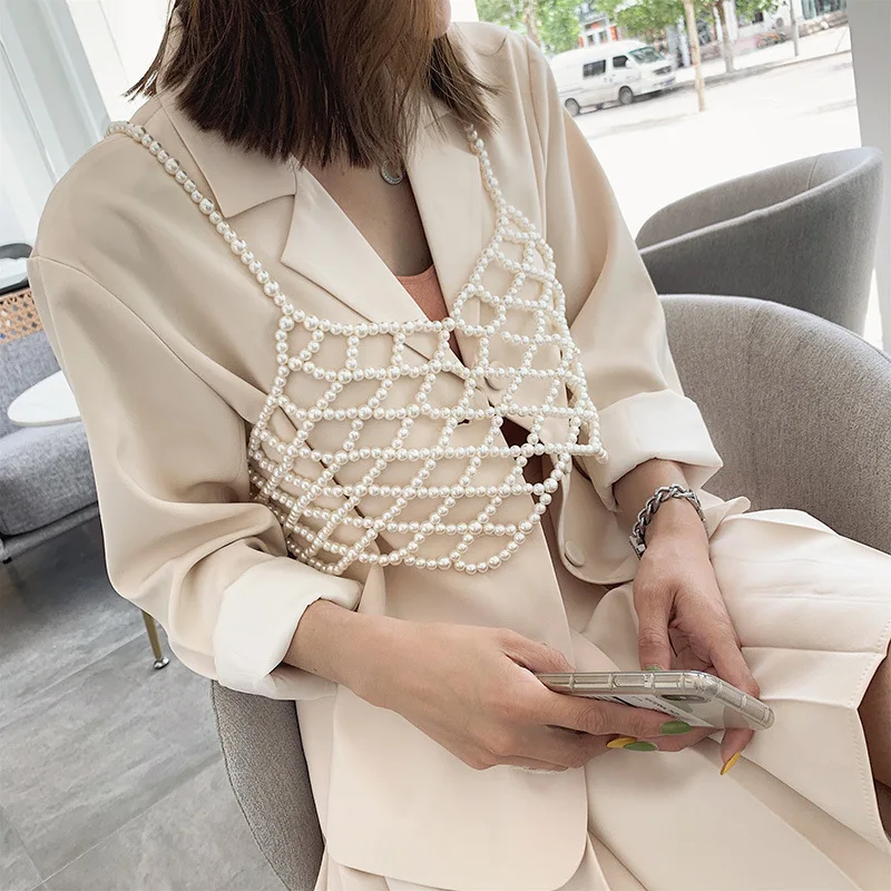 

Cross-border hot style fashion pearl lady handmade vest Europe and the United States trend of creative woven jewelry strap chest