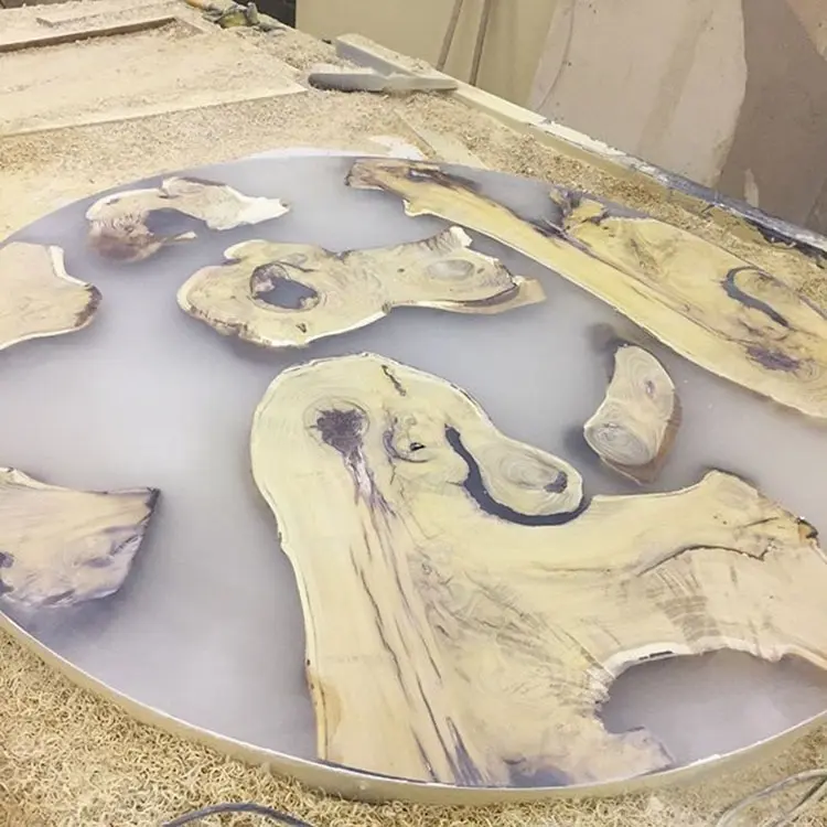 эпоксидная смола epoxy. эпоксидная смола. изделия из жидкого стекла. техника resin art эпоксидная смола. стол из эпоксидной смолы и дерева.