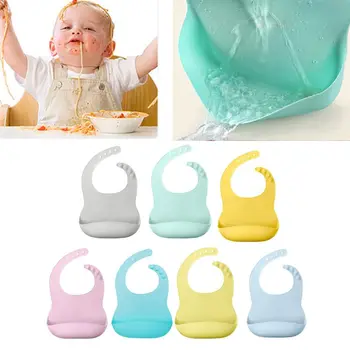 

Solid Color Baby Silicone Waterproof Bib with Pockets Feeding Saliva Towel Apron Designed With A deep and Wide Crumb Catcher