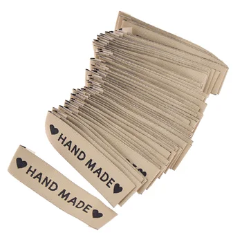 

50pcs/pack Heart Washable Cloth Clothing Labels Hand Made Printed DIY Craft Sewing Bags Shoes Tags Decoration Material