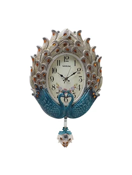 

Clock wall clock living room home fashion Phoenix Peacock personality quartz creative mute charts