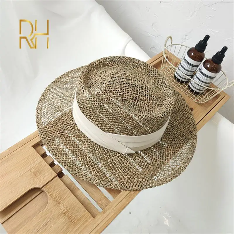 Travel Natural seagrass hollow flat brim hat ladies summer porkpie concave round sun hat beach straw with ribbon beach hat,women sun hat