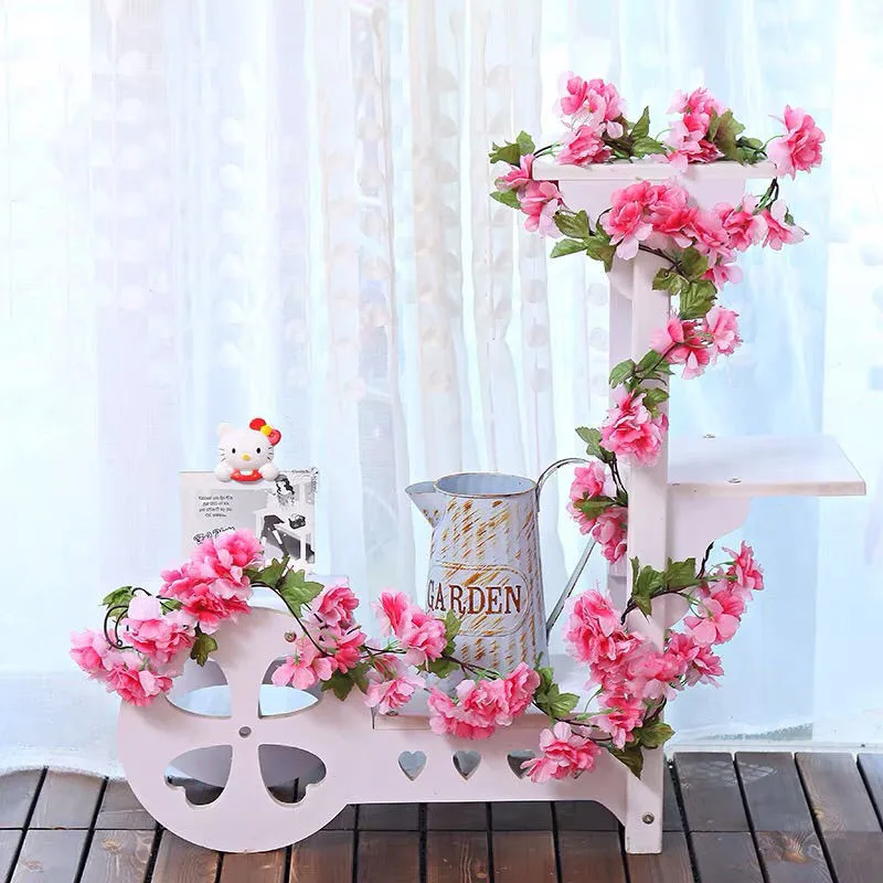 Description Picture 6 of itemArtificial cherry flower vine flowers fake blossoms garland ivy hanging vine home party DIY green leaves hoetl beautiful decor