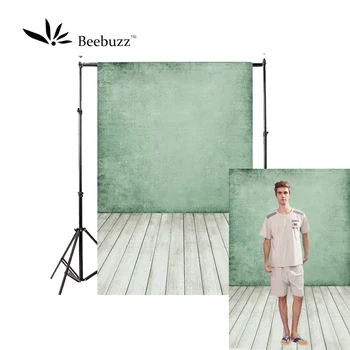 

Light green wall of light Wooden floor background Photography studio photophon