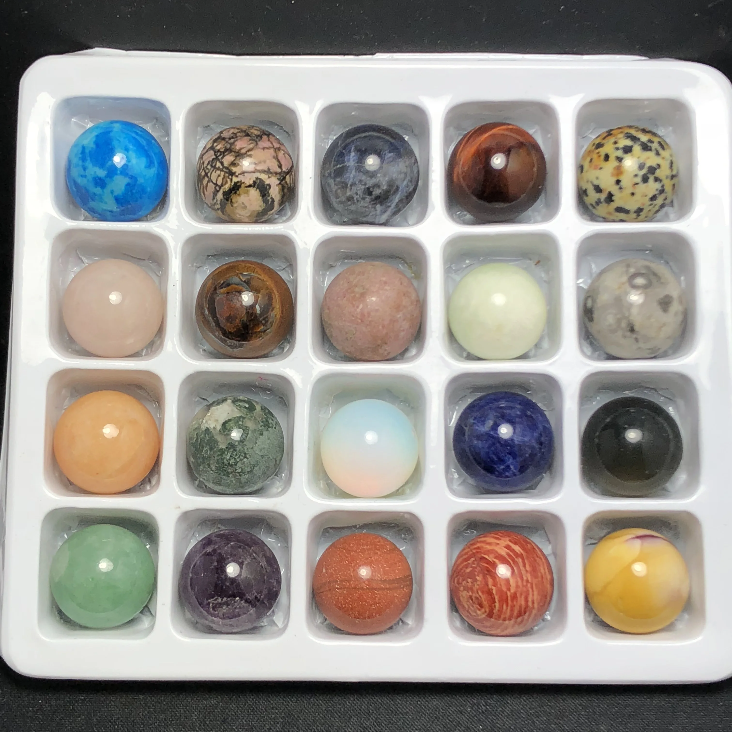 

Natural and colorful variety of feng shui crystal balls, quartz chakras and mineral reiki healing home decor