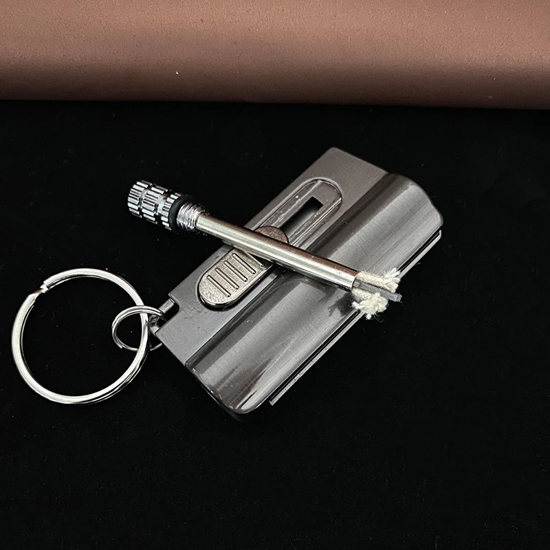 

2020 New Permanent Match Lighter With Knife Outdoor Waterproof Gasoline Keychain Flint Lighter Fire Starter Survival Tool Gadget