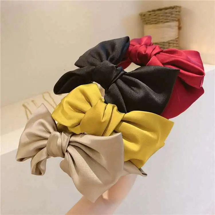 

Manufacturers selling big han edition double spring, summer, autumn paragraph joker satin bow dust hair band
