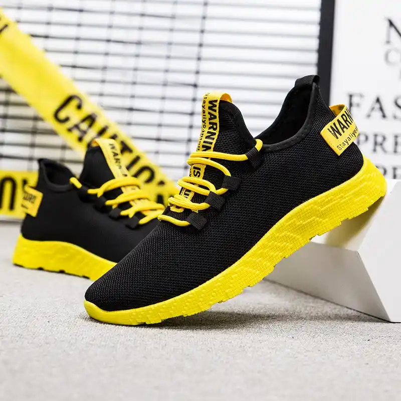mens black and yellow trainers