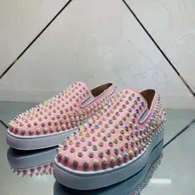 pink spiked loafers