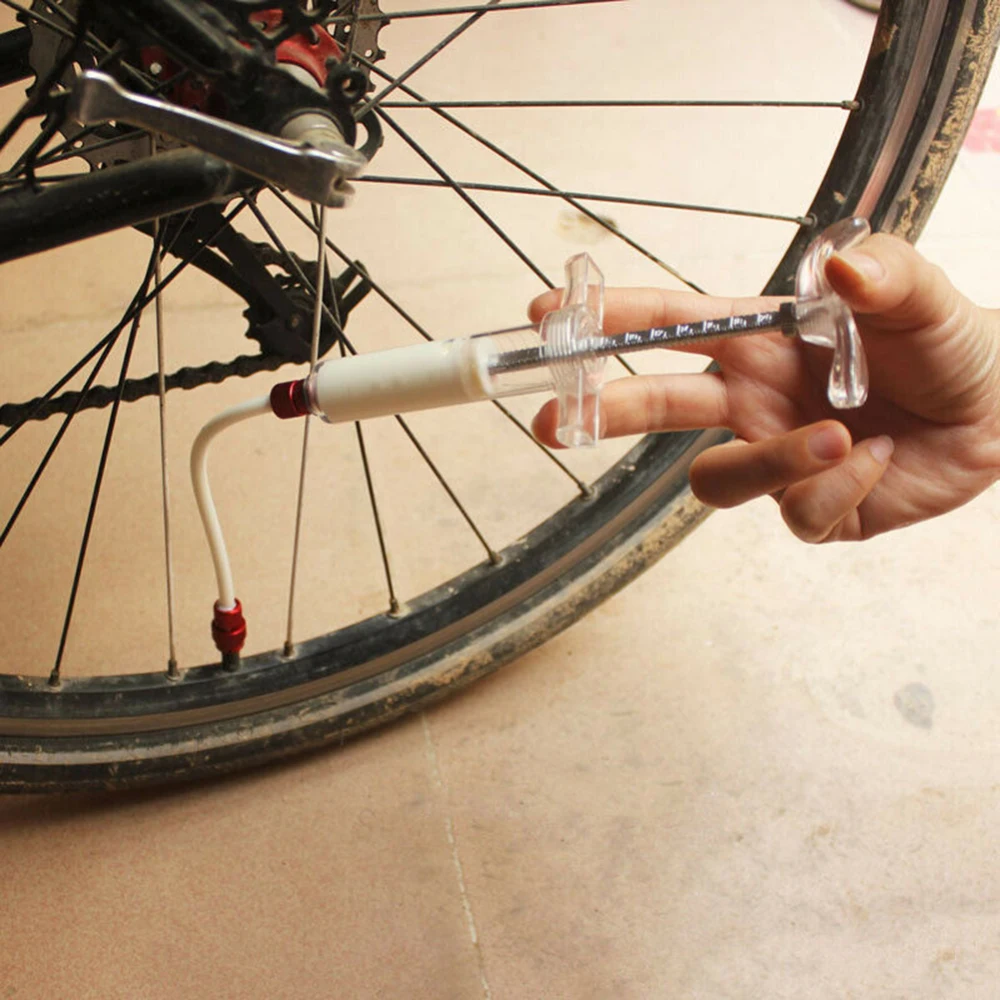 

Universial for Schrader/Presta Valve PVC Sealant Injector Tubeless Tyre Sealant Injector Bike Bicycle Cycling Tire Filling Tool