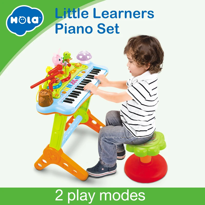 

HOLA 669 Kids Musical Toy Electronic Keyboard Musical Organ With Microphone, Stool, Teaching Light up Keys, Dancing Animal
