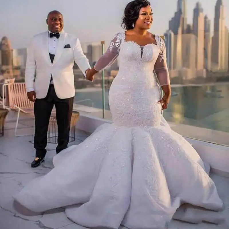 Abiti da sposa a sirena luccicanti Plus Size abiti da sposa sudafricani con perline a maniche lunghe trasparenti Robe De Mariee su misura