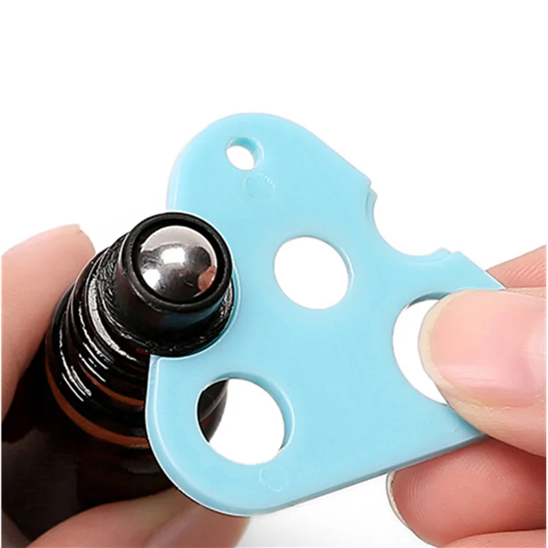 

1Pcs Essential Oil Opener Key Tool Remover for Roller Balls and Caps Bottles Plastic Opener Roller Bottle Corkscrew Tool