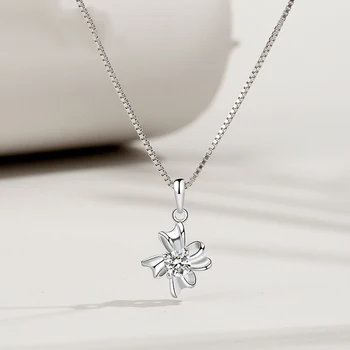 

Genuine S925 sterling silver female bow-knot pendant simple personality zircon student fashion Creativity pendant silverware