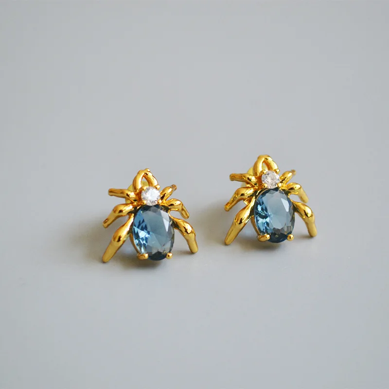 

Japanese and Korean blue glass crystal zircon flashing spider shape weird earrings