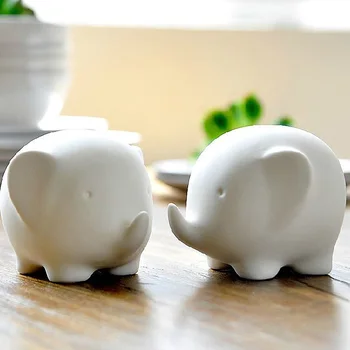 

Brieff Lucky Feng Shui Elegant Elephant Trunk Statue Ceramic White Figurine Crafts Ornaments for Home Office Desktop Decor Gift