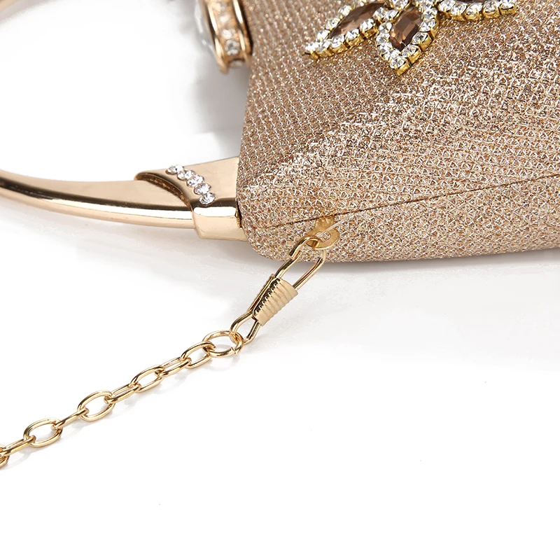 Luxy Moon Champagne Clutch Bag With Metal Handle with Chain Chain Lock Detail View