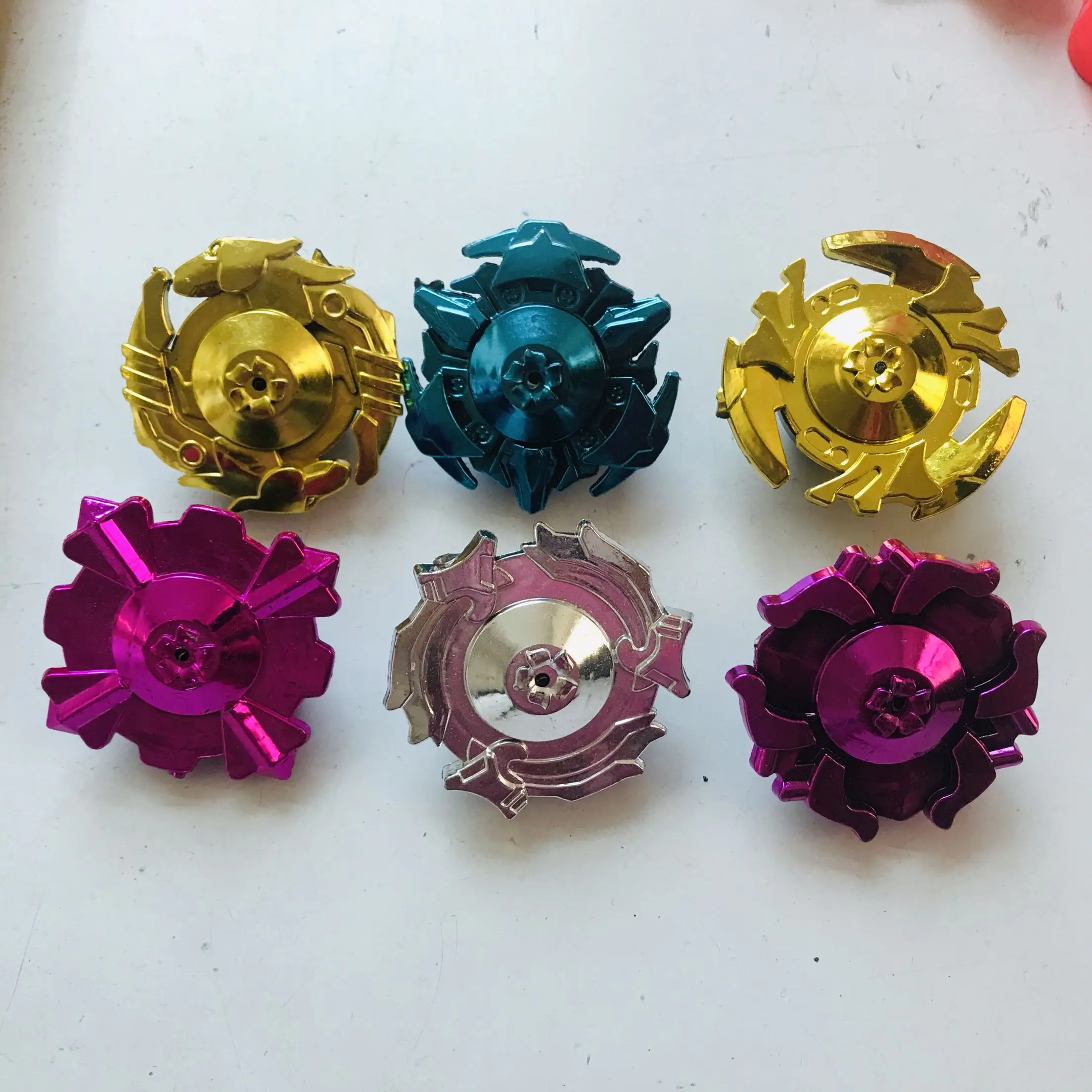 

Newest Beyblades Tops Burst Spinning Top Pull Gyro Arena Toupie Decompression Gyroscope Launchers Blades Metal Toys for Children