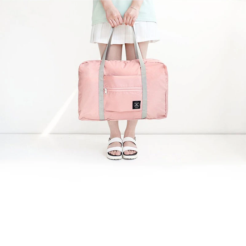 Качественные вместительные дорожные сумки дорожные мешки для хранения одежды женские портативные сумки для путешествий многофункциональные складные дорожные сумки - Цвет: Pink
