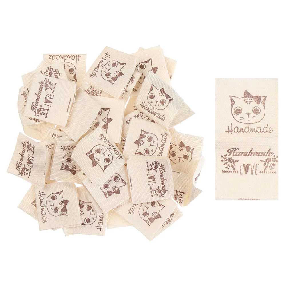 Description Picture 3 of item50PCS Handmade With Love Cloth Garment Labels Cartoon Cat Woven Knitted Supplies Heart Pattern Clothing Tags Sewing Accessories