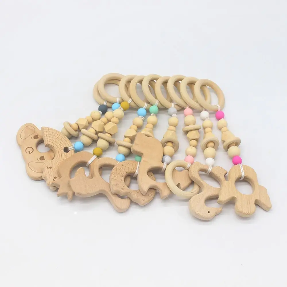 

1pc Wooden Ring Baby Teether Animals Teething Ring Cartoon Animal Bracelets Chain Rattles Elephant Teething Toys Baby Products