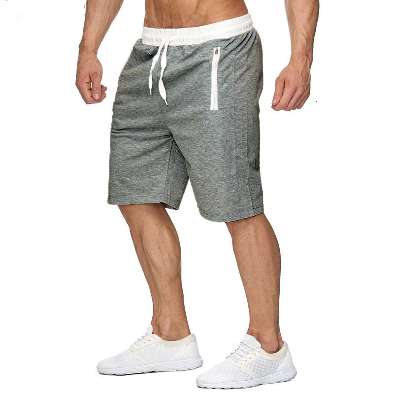 Мужские пляжные шорты, летние новые дышащие мужские спортивные шорты, быстросохнущие шорты для плавания, одноцветные плавки с эластичной резинкой на талии