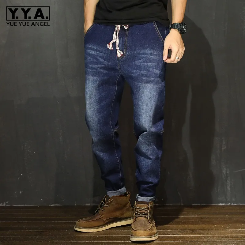 

Fashion Mens Loose Fit Harem Pants Plus Size 7XL Elastic Waist Jeans Casual Streetwear Hip Hop Long Joggers Pants Denim Pants