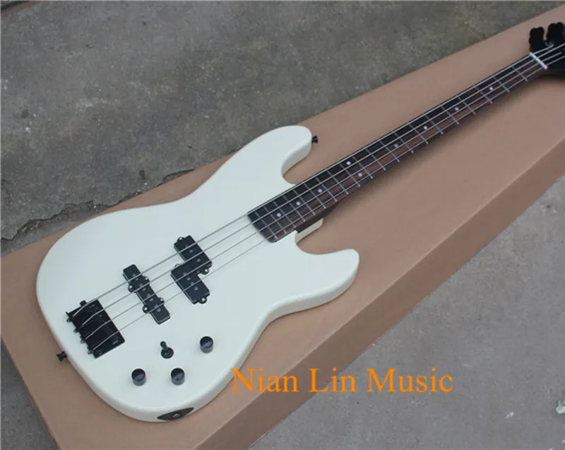 

4-String Bass Guitar,White color Body,Rosewood Fingerboard,3 Single Open Pickups,Black Hardware and can be Customized