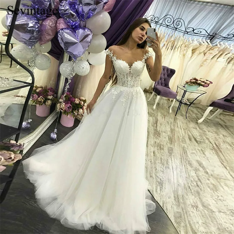 

Sevintage A Line Illusion Cap Sleeve Tulle Boho Wedding Dresses Scoop Sweep Train Lace Bridal Gowns Vestido De Noiva 2020