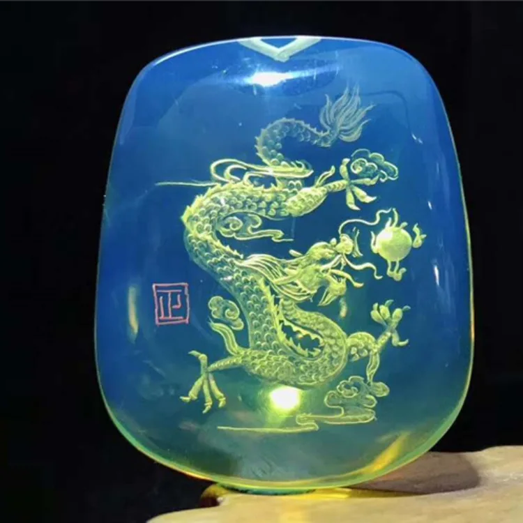 

Dragon in the Day Carving Blue Amber Raw Ore Entirely Natural Blue Amber Pendant Stone Entirely Natural Multicolored Jewelry