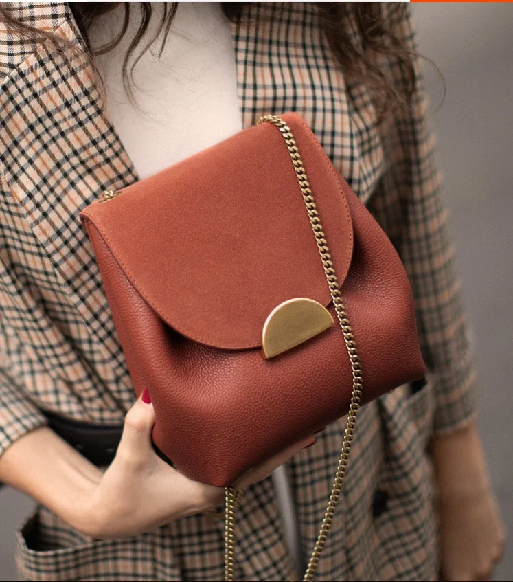 

Ai shang mei bag factory custom French niche design bucket bag female fall/winter 2020 new chain cross-body bag