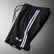 Minglu, летние мужские шорты, роскошные, с вышивкой стрекозы, эластичный пояс, мужские шорты размера плюс 4xl, черные, одноцветные, мужские брюки