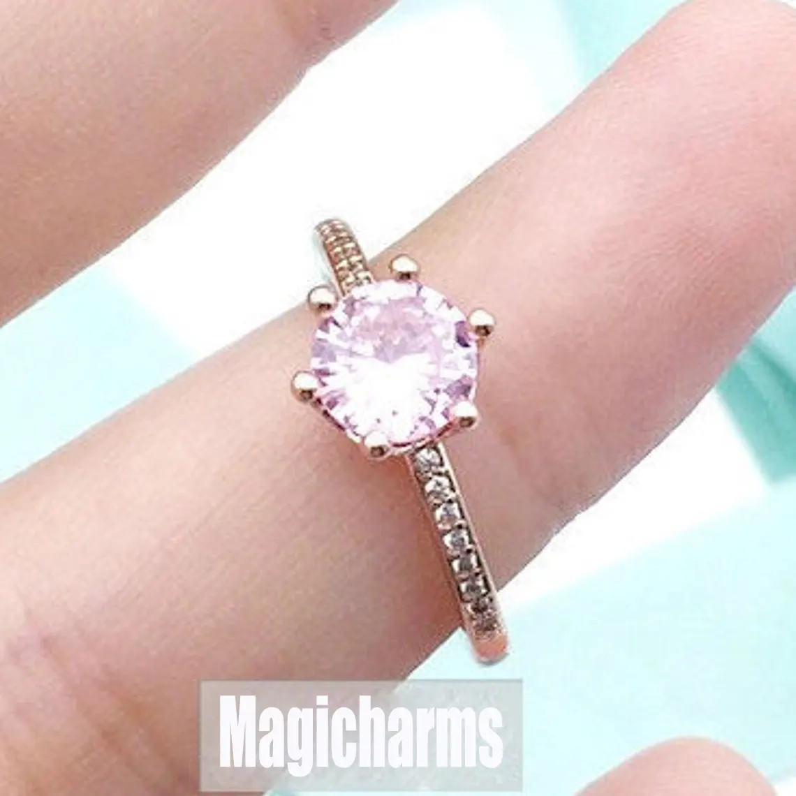 Pink Sparkling Crown Solitaire Ring