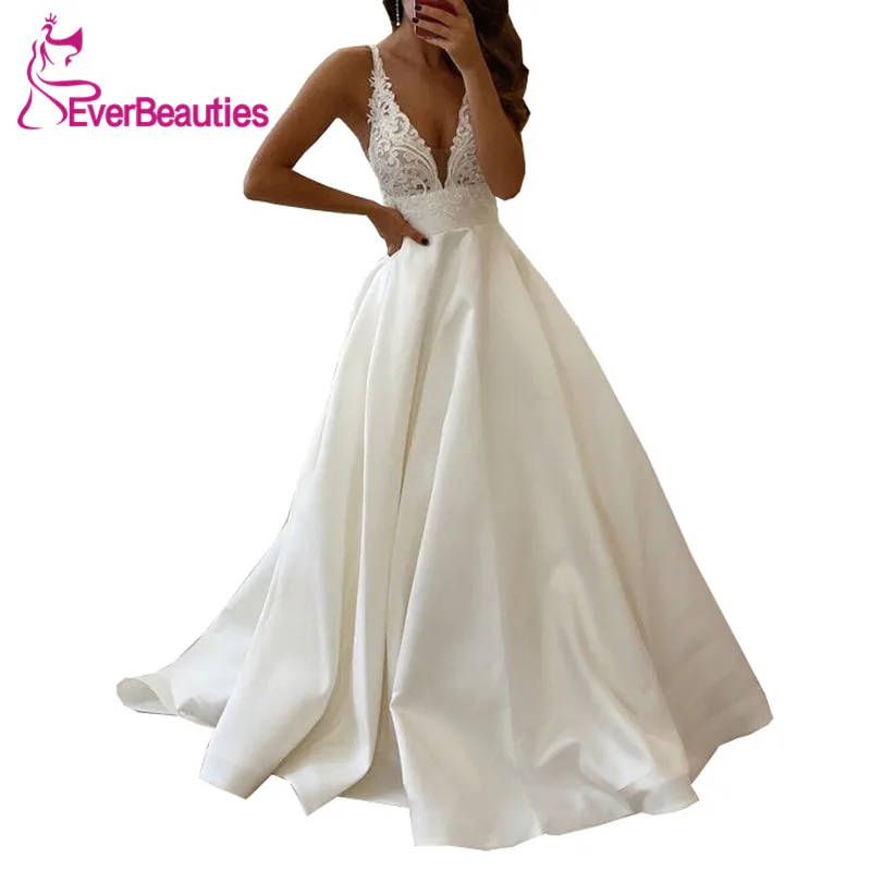

Robe De Mariee Wedding Dresses With Pockets 2020 V-Neck Satin Appliques Backless Bride Dress Wedding Gowns Vestido De Noiva 2020