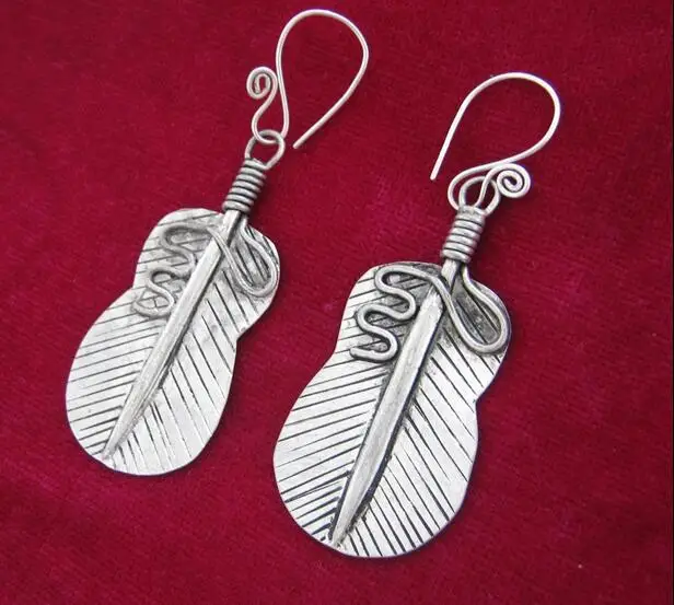 

Miao nationality's Retro earrings Hanfu accessories handmade Miao silver earrings banana fans