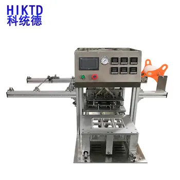 

Pneumatic automatic tea cup jam cup aluminum plastic cup sealing machine