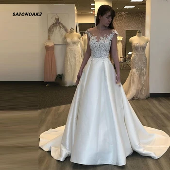 

SATONOAKI 2019 A Line Satin Wedding Dresses Lace Appliques Sexy See Through Top Scoop Neck Short Sleeves Backless Wedding Gown