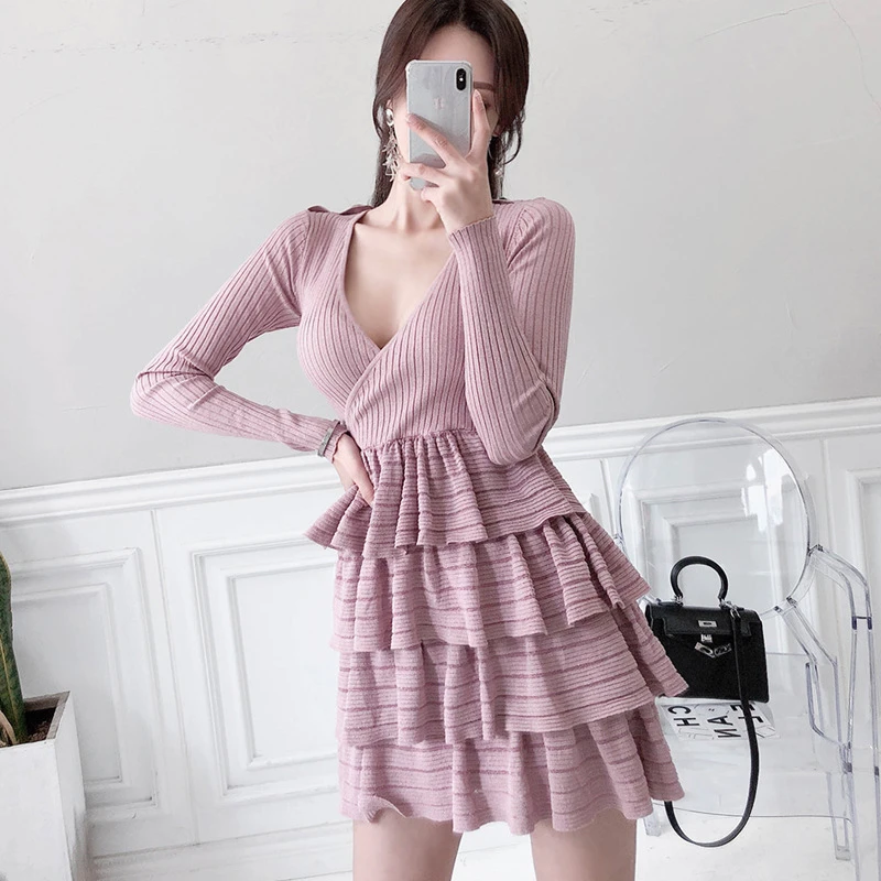 pink pleated dress with long sleeves
