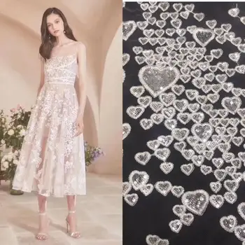

high quality embroidered net lace fabric with heart flower african white color tulle net fabric with sequins for fashion dress