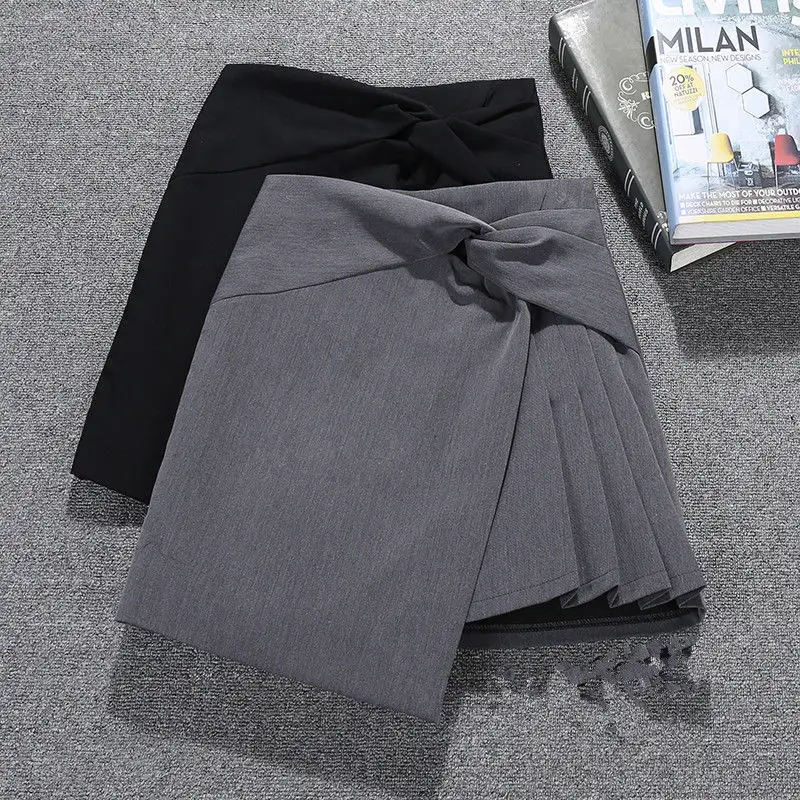 

Irregular light skirt women's 2020 spring and autumn new high-waisted thin a-word bag hip skirt a hundred short skirts.